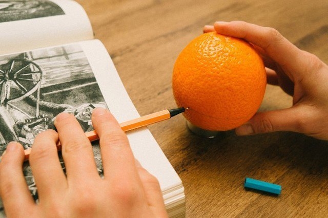 Подсвечники из апельсинов.