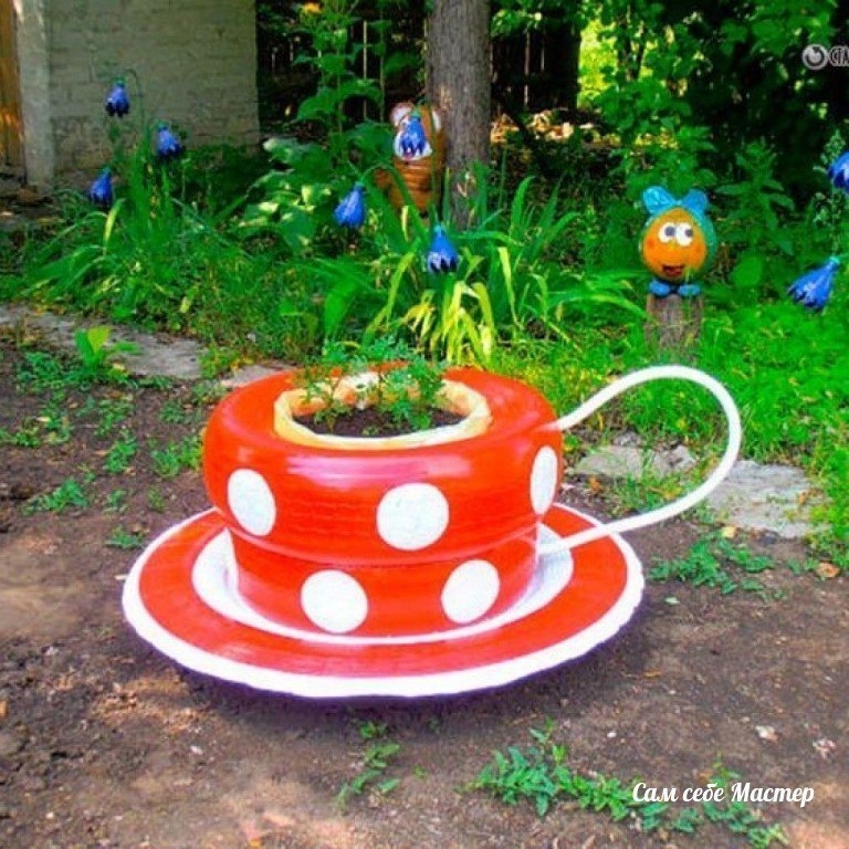 Клумбы и цветники из шин своими руками