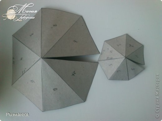 Миниатюрная беседка из газетных трубочек.