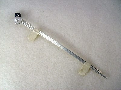 Кольцо из жемчуга и проволоки.