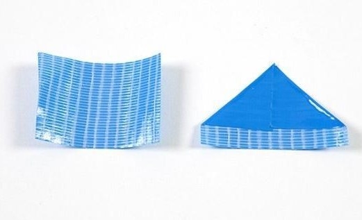 Цветы из строительной ленты.