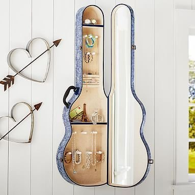 Из гитары...