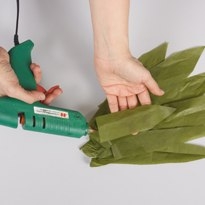 Оригинальная упаковка для шампанского в виде ананаса.