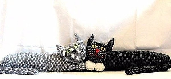 Подушки от сквозняков