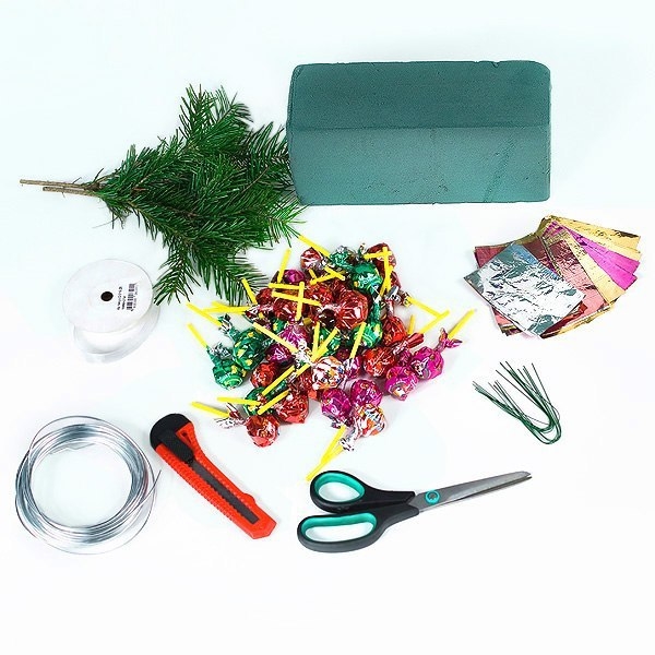 Новогодний шар из «Чупа-чупсов» Новогодний шар из «Чупа-чупсов»