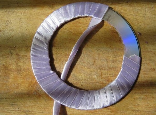 Прихват для штор из диска