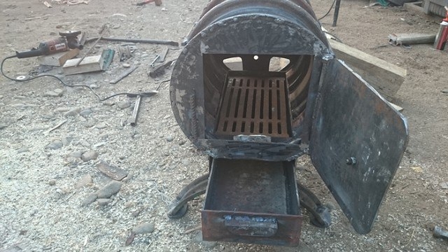 Оцените, печка из колесных дисков R14. Ваше мнение?