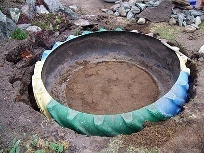 Декоративный пруд из покрышки своими руками